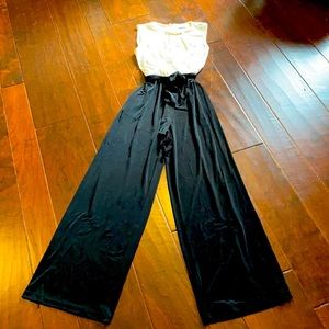 Calvin Klein 1 piece jersey fabric jumpsuit-creme top & black pant w/ tie waist
